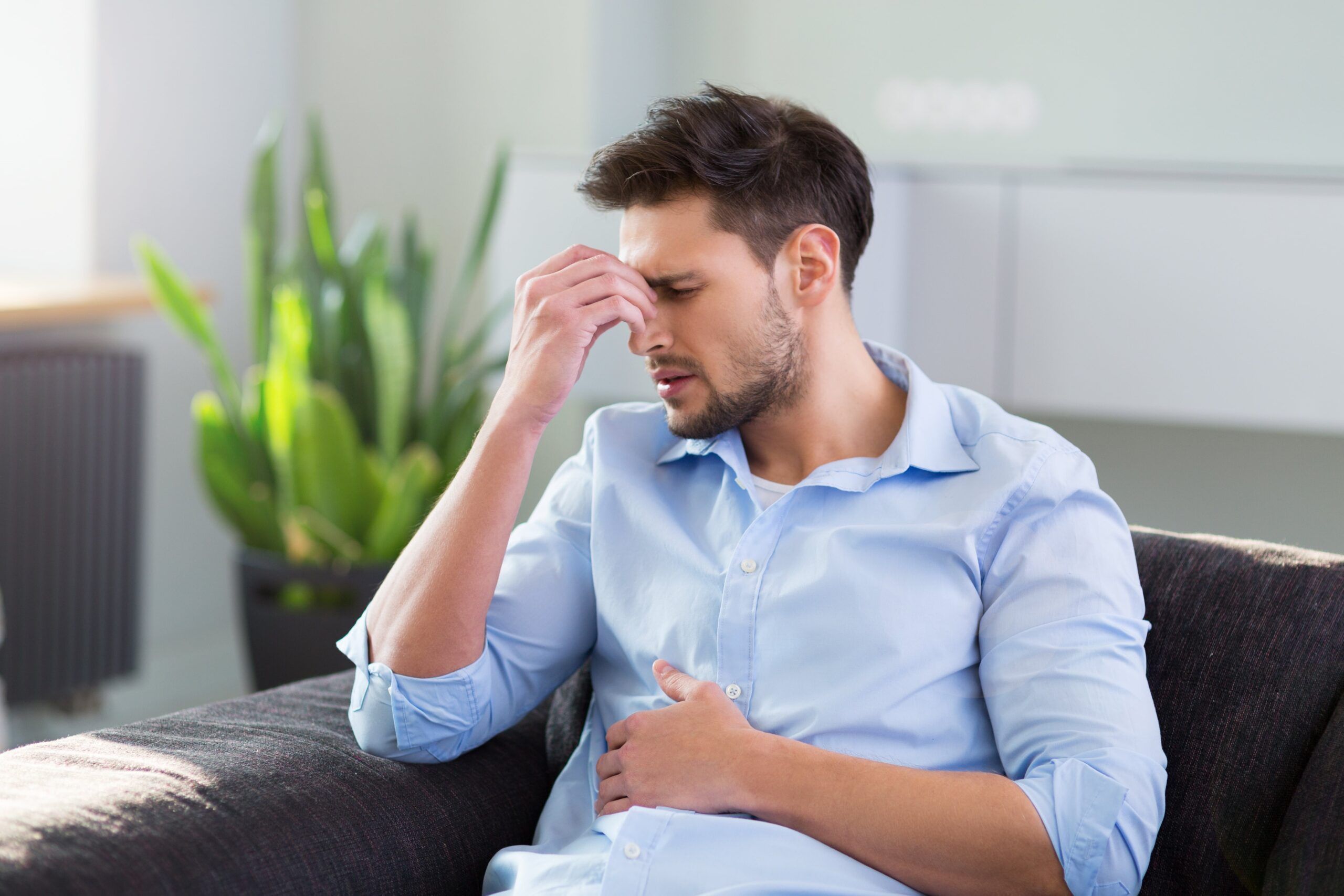 Man is wondering if alcohol can cause stomach ulcers