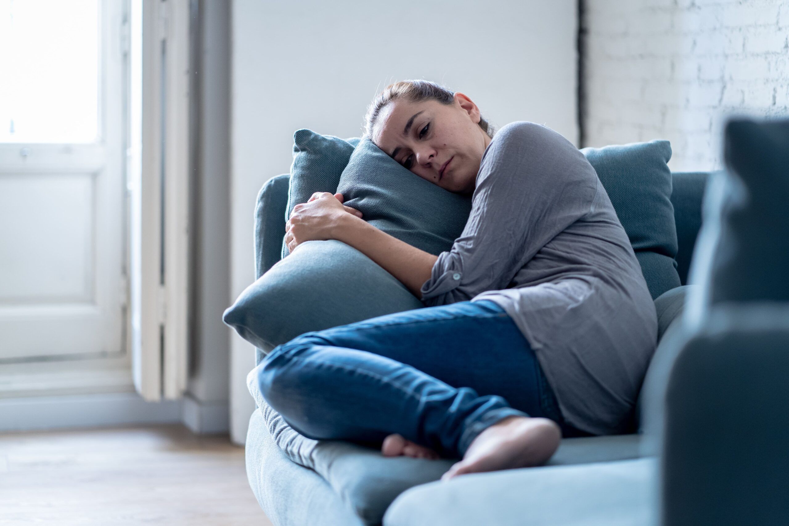 Woman experincing the signs and symptoms of cannabinoid hyperemesis syndrome