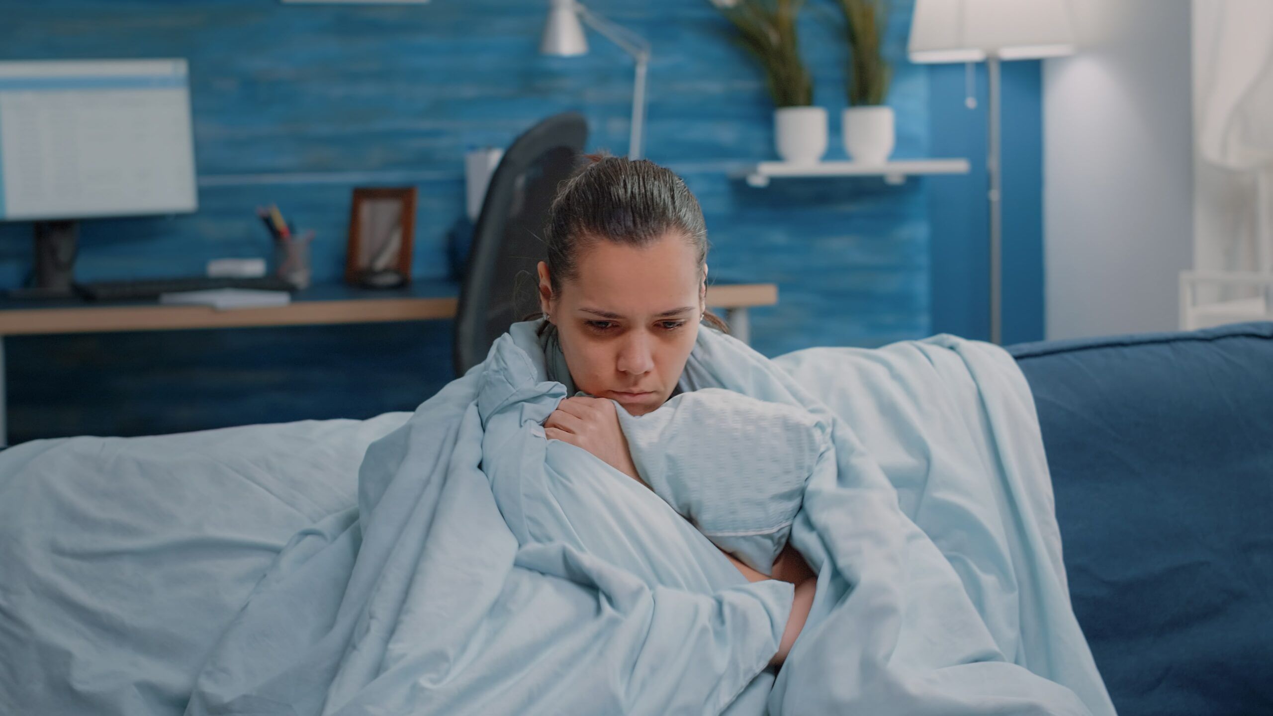 Woman with the alcohol shakes after a night out