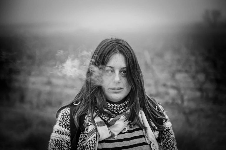 Women Smoking weed Outside is experiencing cannabis-induced psychosis