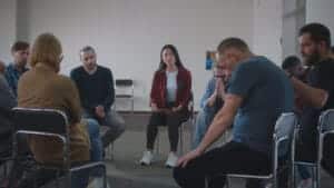 People at a 12 steps of AA meeting