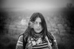 Women Smoking weed Outside is experiencing cannabis-induced psychosis